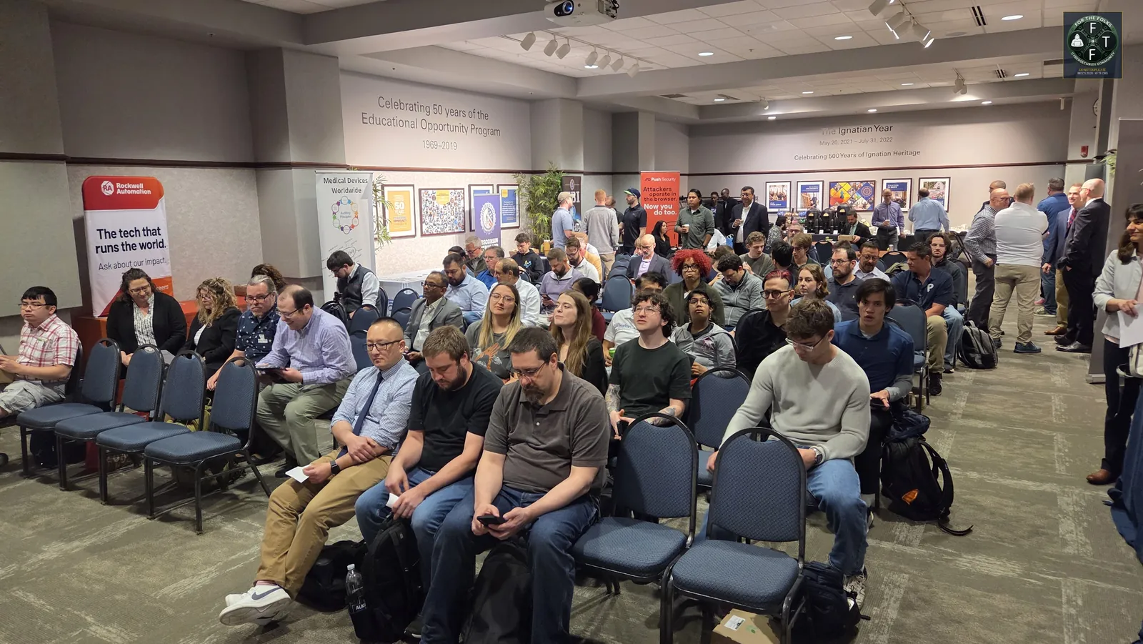 Audience filling the main hall before the keynote